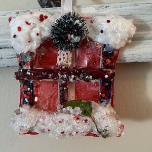 Festive Red and White Holiday Ornament looking out a snowy window. Handmade
